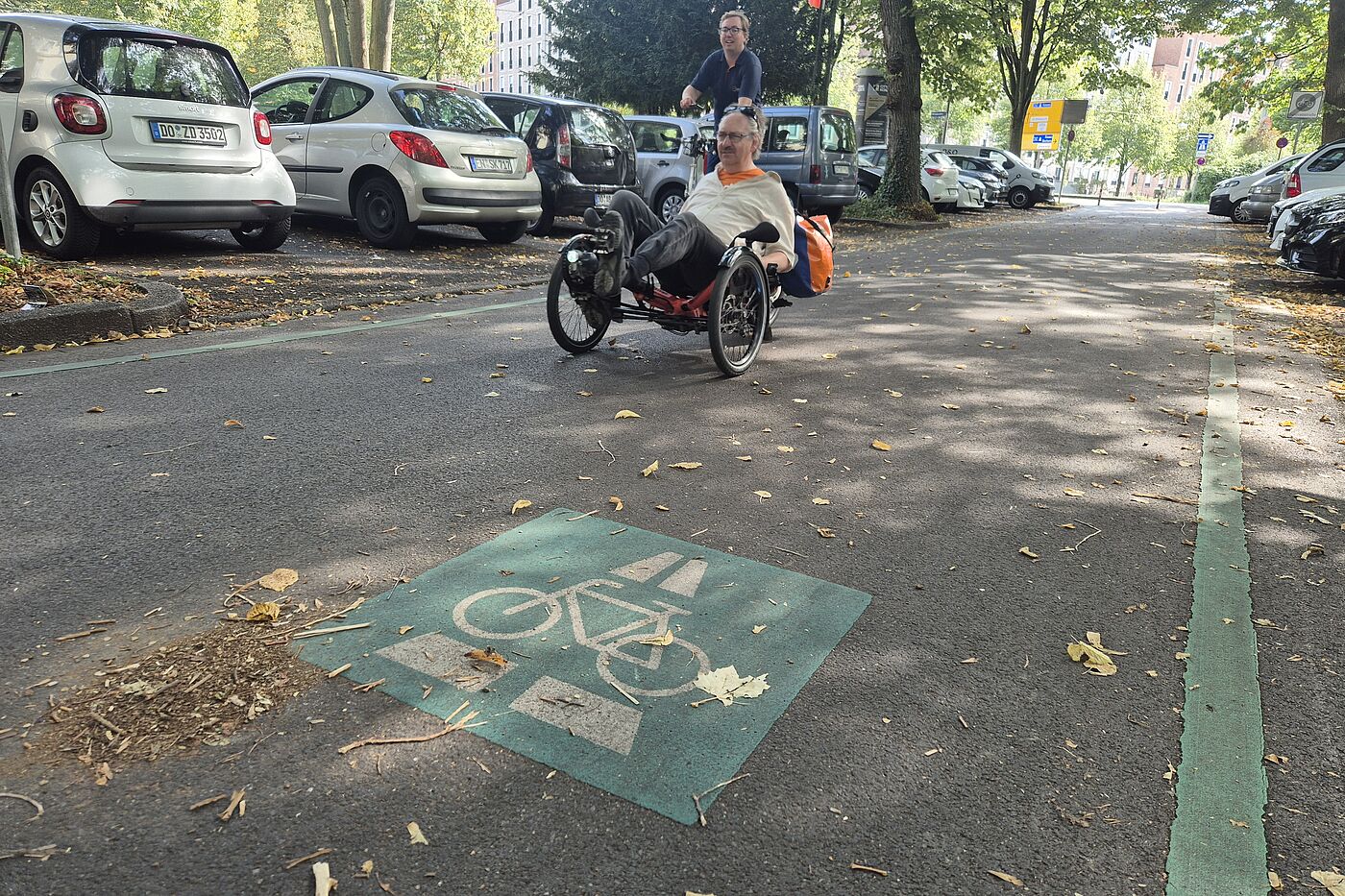 2025-09_Exkursion_Mobilitaet_Dortmund__ADFC_NRW Symbol RS1 und Radfahrer.